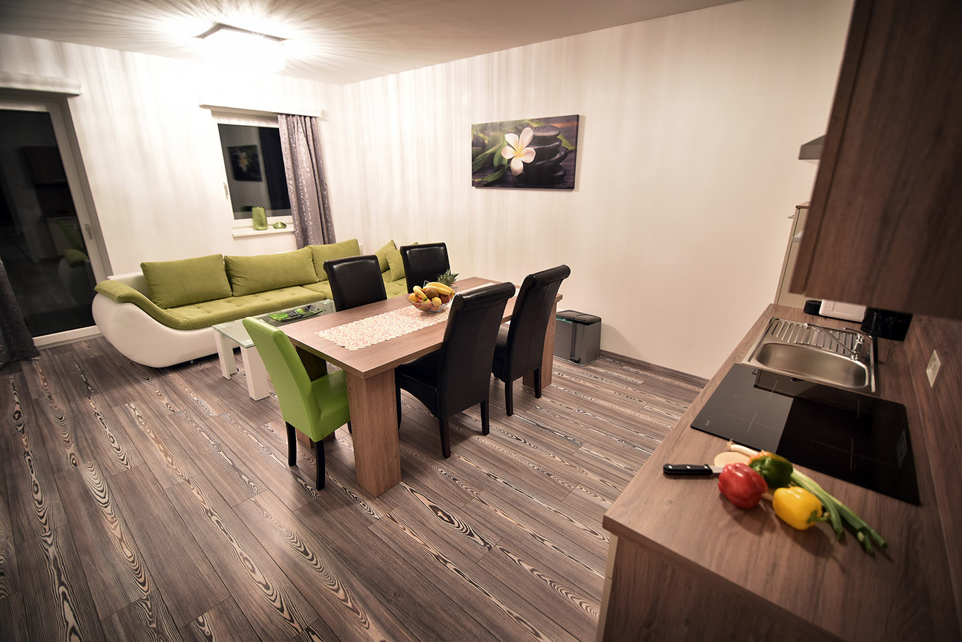 livingroom with kitchen- & diningarea